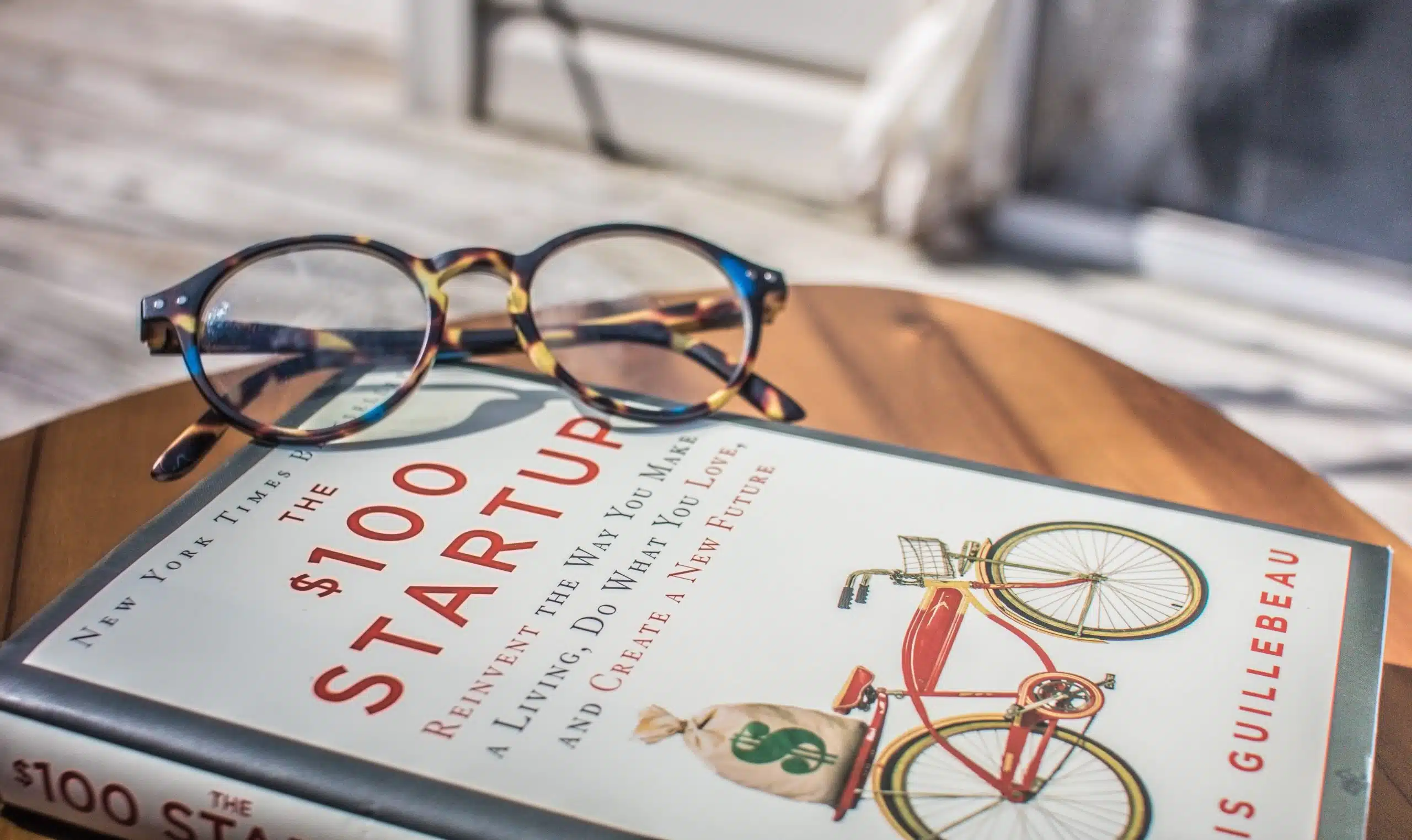 Reading Glasses Perched Atop a Book