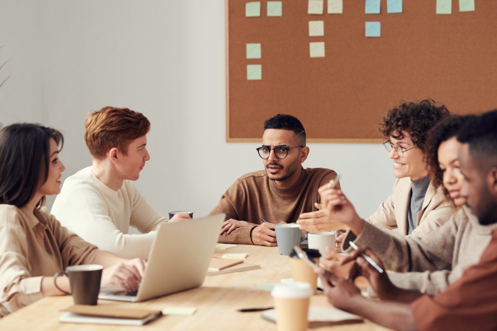 A group of team members discussing a project