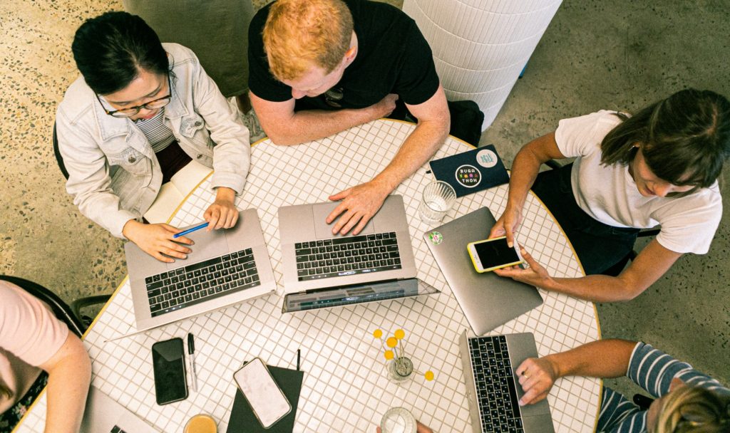 A group of team members sitting at a table