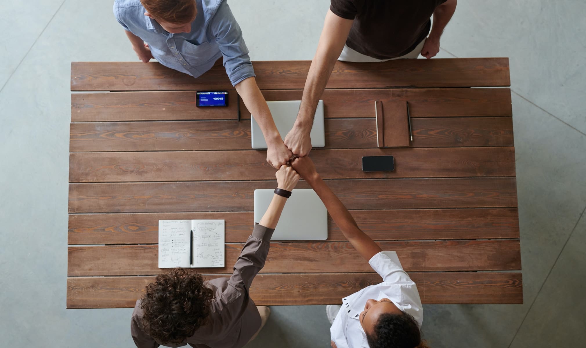 A group of team members at a desk