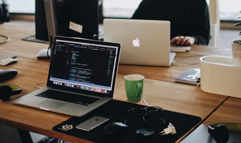 A group of coders at a table